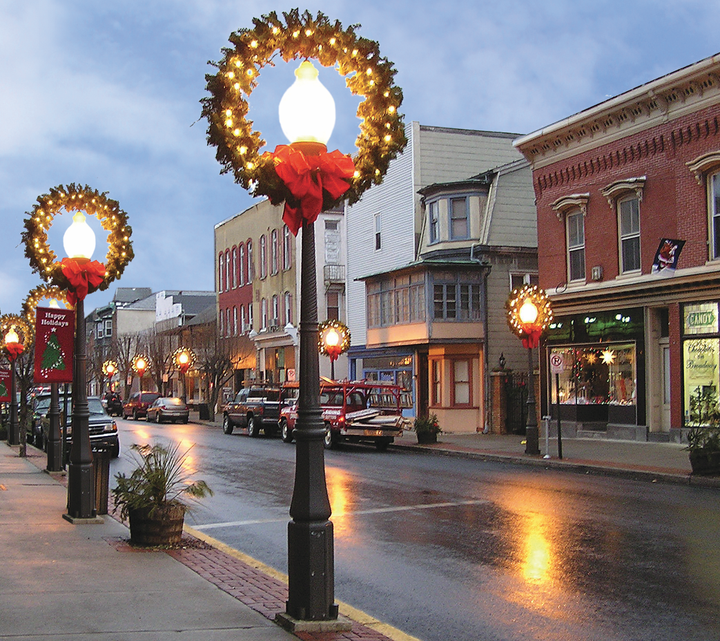 Commercial Christmas decorations lining downtown on a main street.
